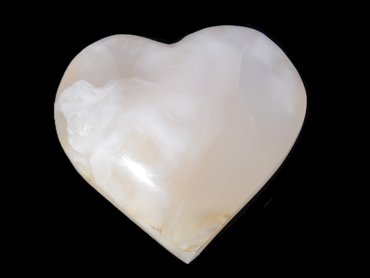 Mangano Calcite hand-carved heart 56*54*20mm 87.5g Rocks and Things