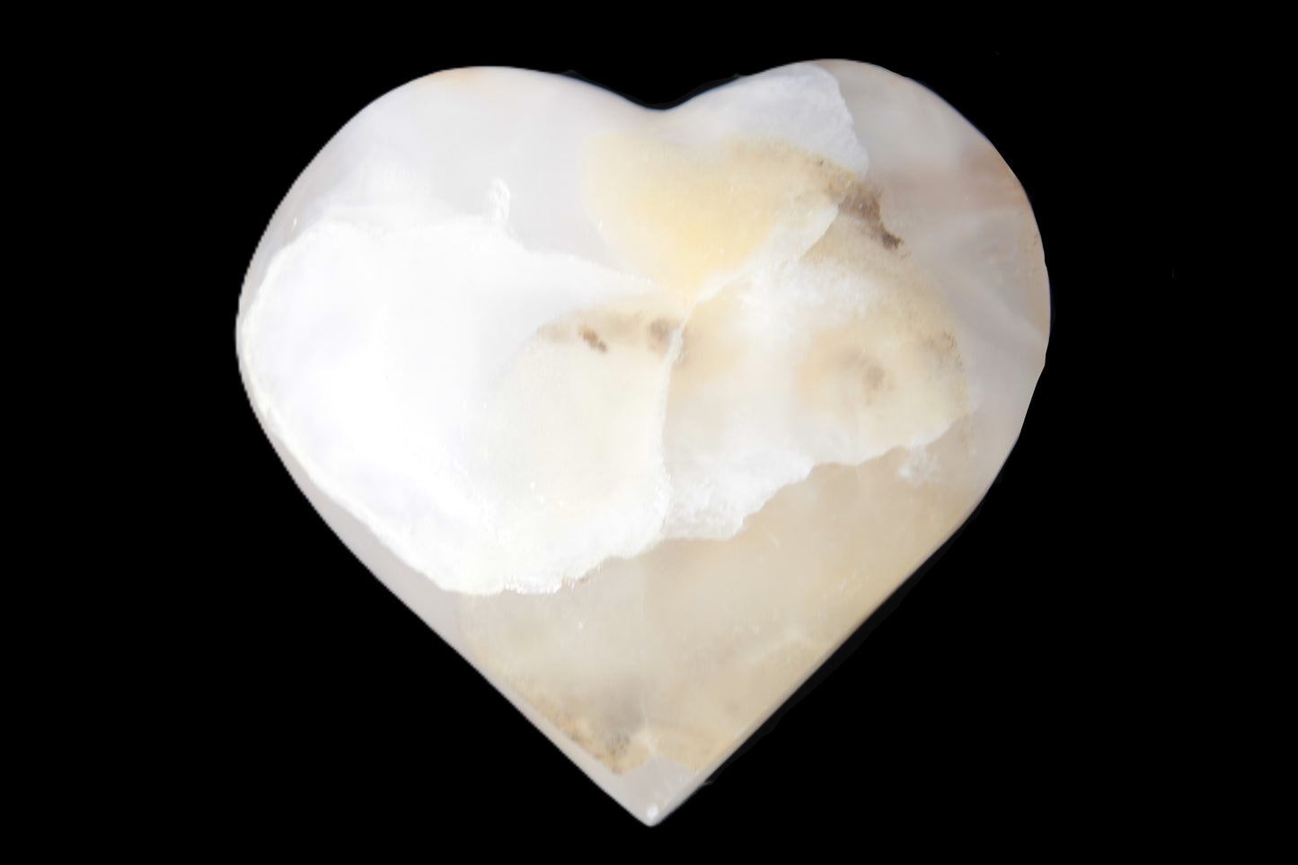 Mangano Calcite hand-carved heart 56*54*20mm 87.5g Rocks and Things