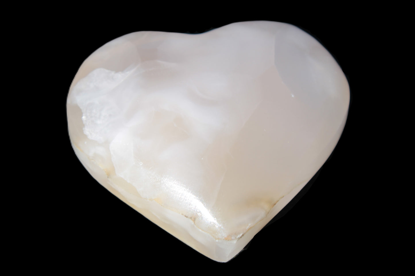 Mangano Calcite hand-carved heart 56*54*20mm 87.5g Rocks and Things