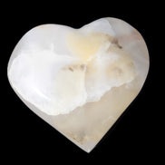Mangano Calcite hand-carved heart 56*54*20mm 87.5g Rocks and Things
