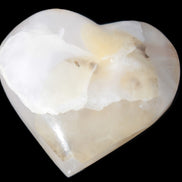 Mangano Calcite hand-carved heart 56*54*20mm 87.5g Rocks and Things