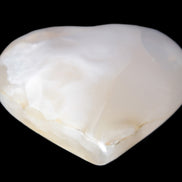 Mangano Calcite hand-carved heart 56*54*20mm 87.5g Rocks and Things