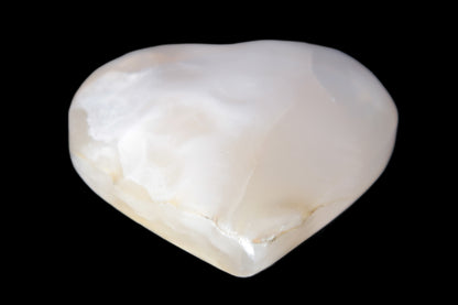 Mangano Calcite hand-carved heart 56*54*20mm 87.5g Rocks and Things