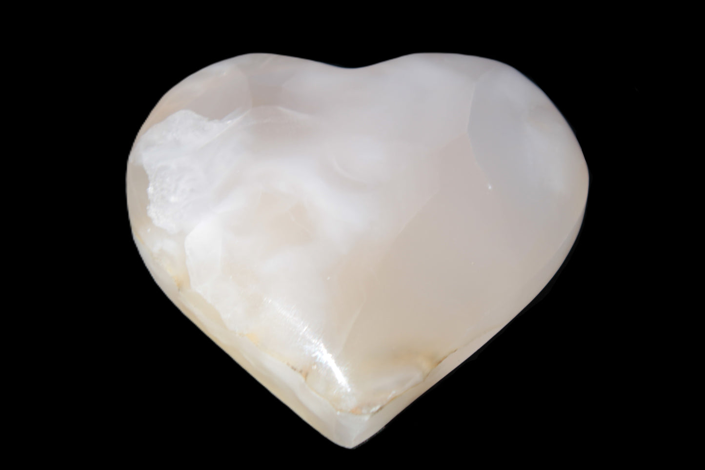 Mangano Calcite hand-carved heart 56*54*20mm 87.5g Rocks and Things