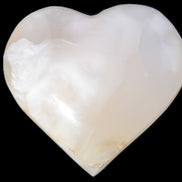 Mangano Calcite hand-carved heart 56*54*20mm 87.5g Rocks and Things