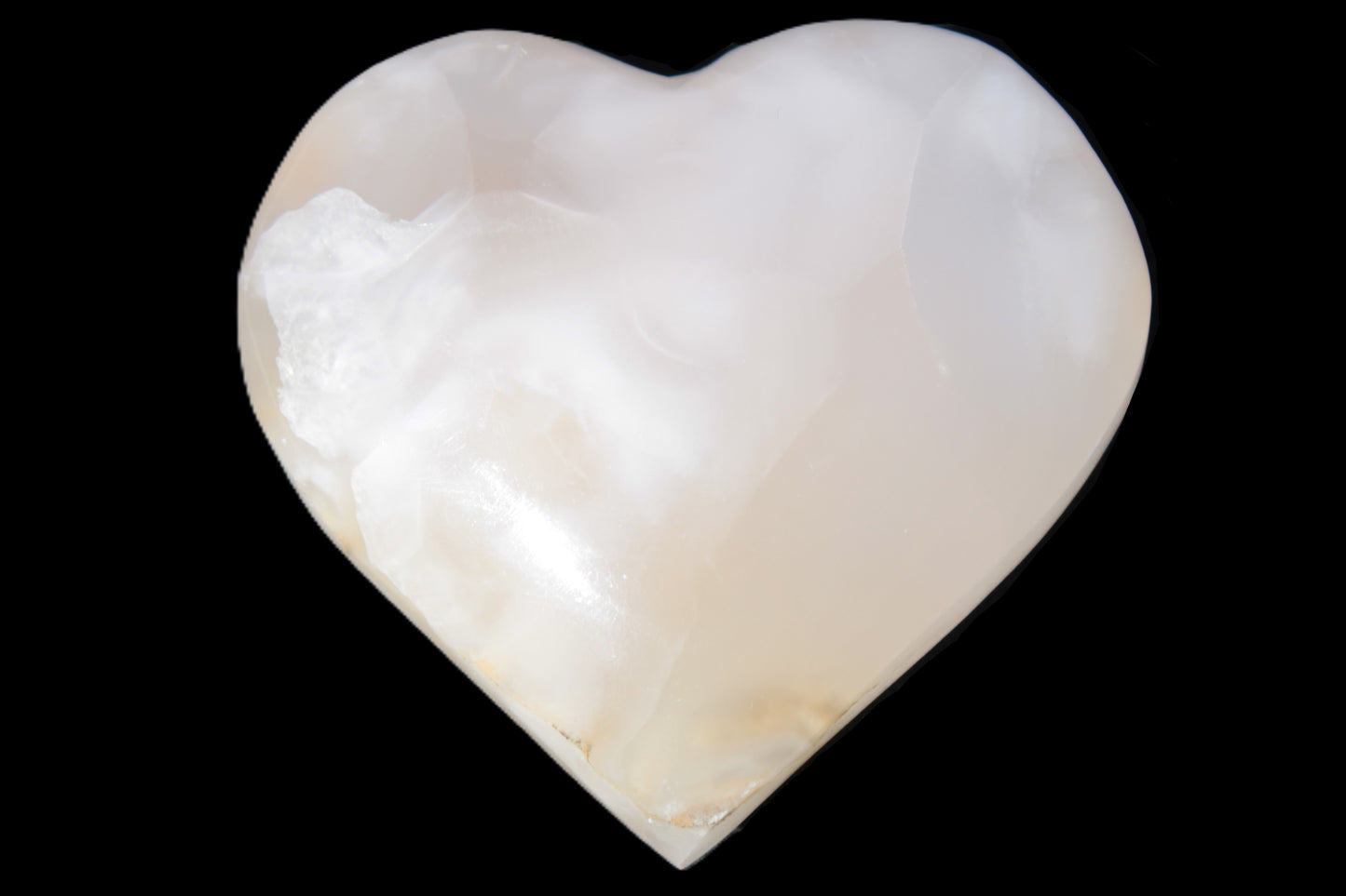 Mangano Calcite hand-carved heart 56*54*20mm 87.5g Rocks and Things