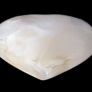 Mangano Calcite hand-carved heart 56*54*20mm 87.5g Rocks and Things