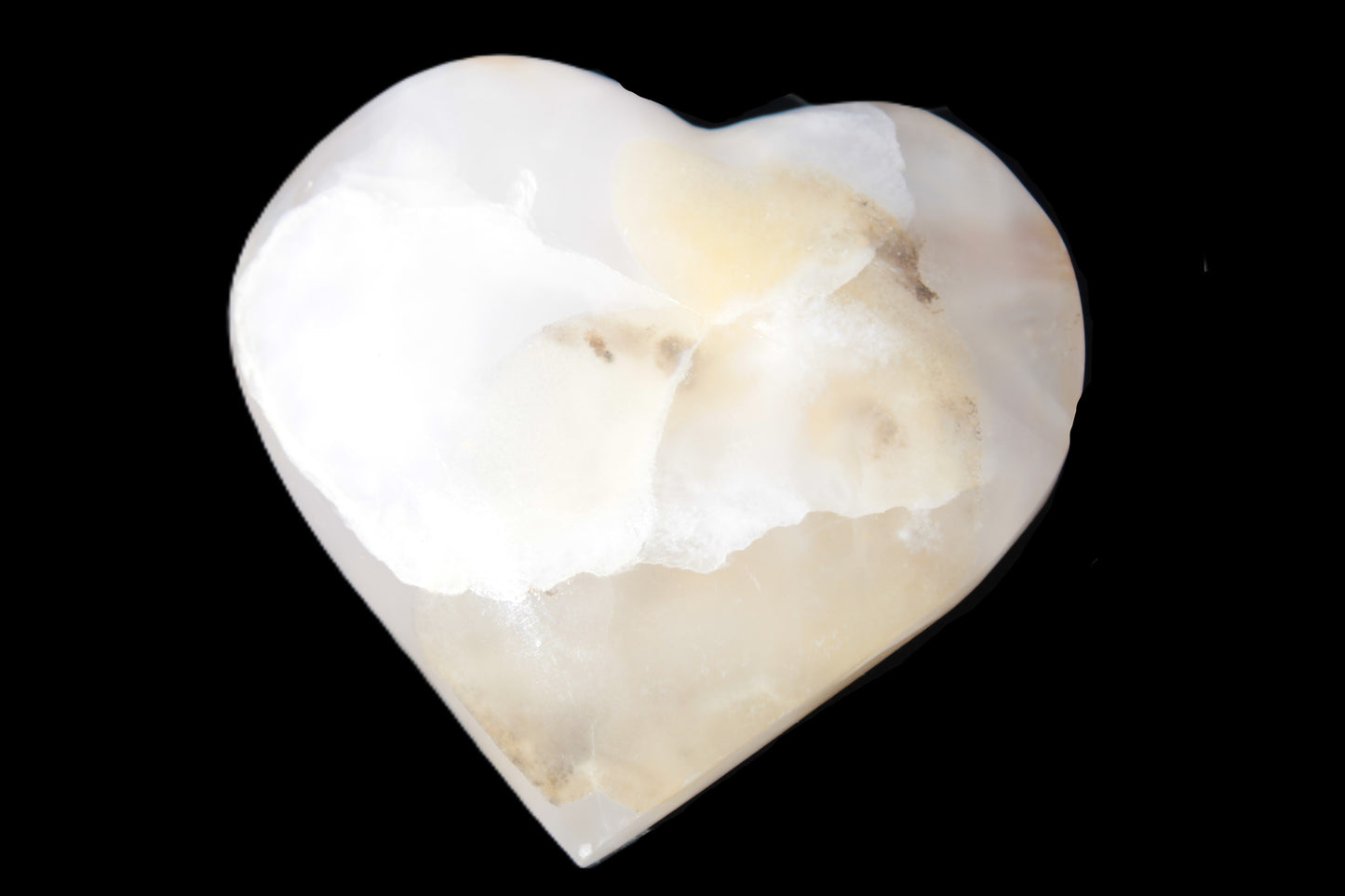 Mangano Calcite hand-carved heart 56*54*20mm 87.5g Rocks and Things