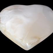 Mangano Calcite hand-carved heart 56*54*20mm 87.5g Rocks and Things