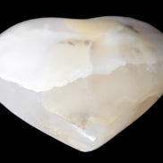 Mangano Calcite hand-carved heart 56*54*20mm 87.5g Rocks and Things