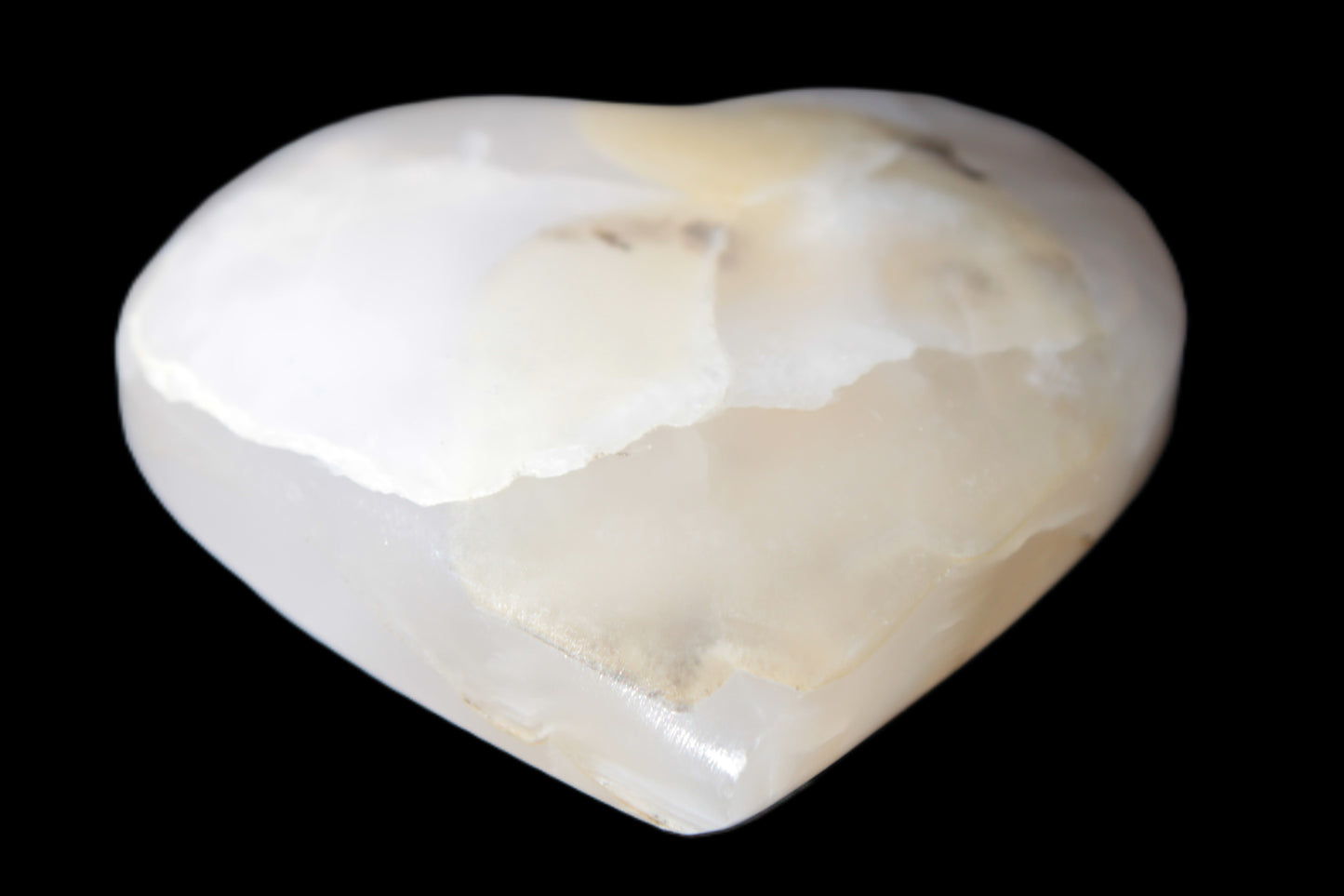 Mangano Calcite hand-carved heart 56*54*20mm 87.5g Rocks and Things