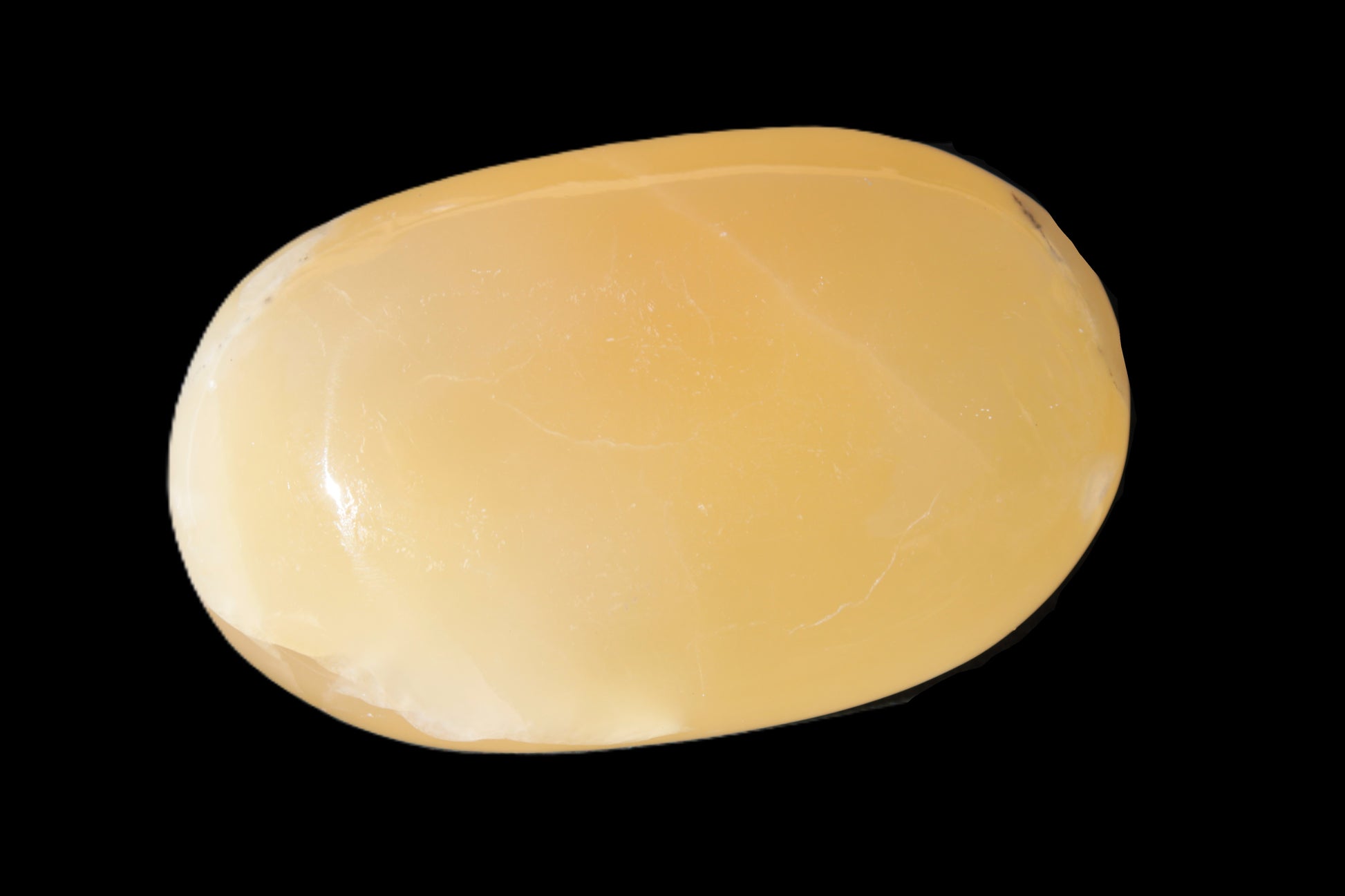 Honey Calcite palm stone 58-62mm 83-95g Rocks and Things