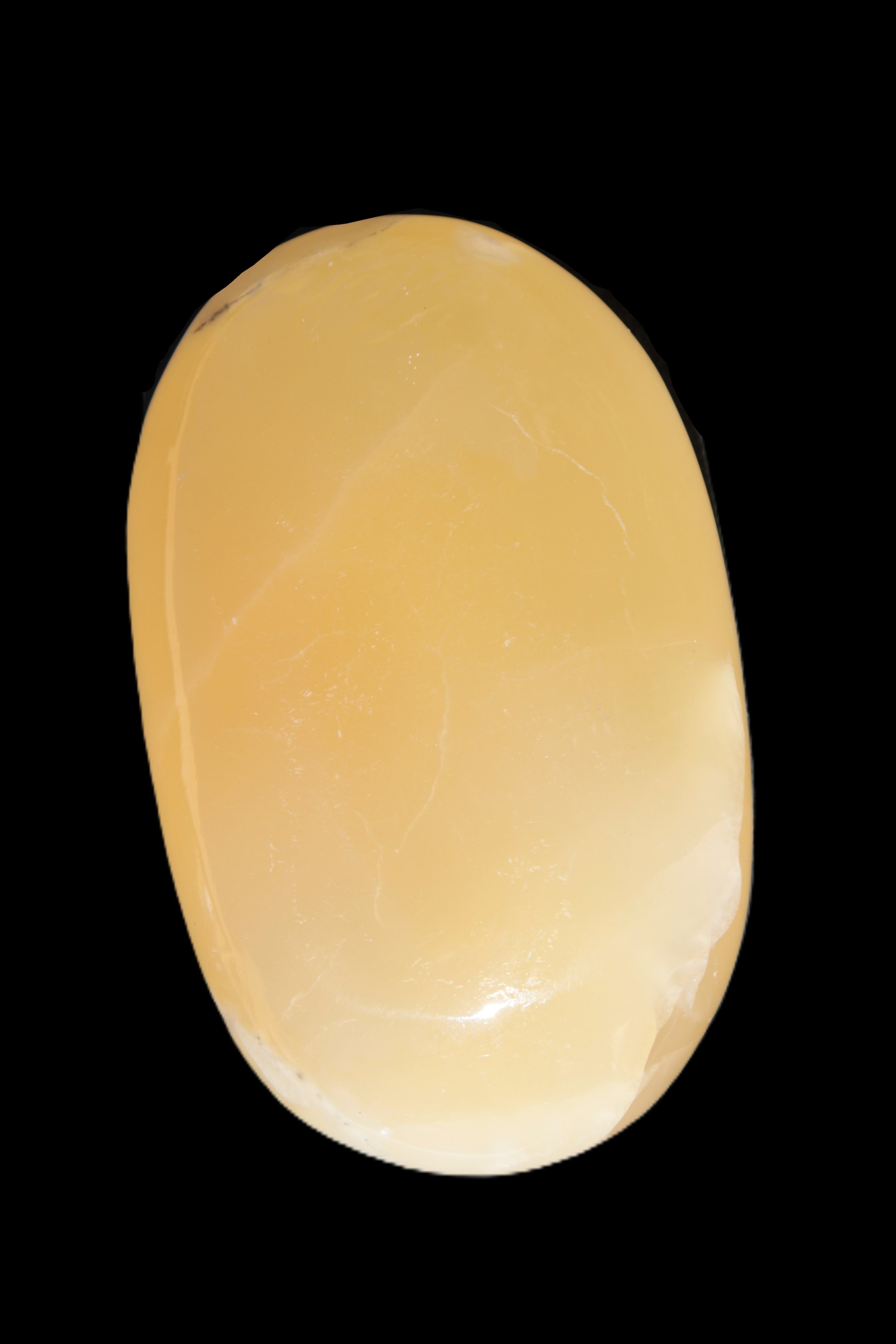Honey Calcite palm stone 58-62mm 83-95g in sunshine - Rocks and Things Store