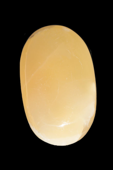 Honey Calcite palm stone 58-62mm 83-95g in sunshine - Rocks and Things Store