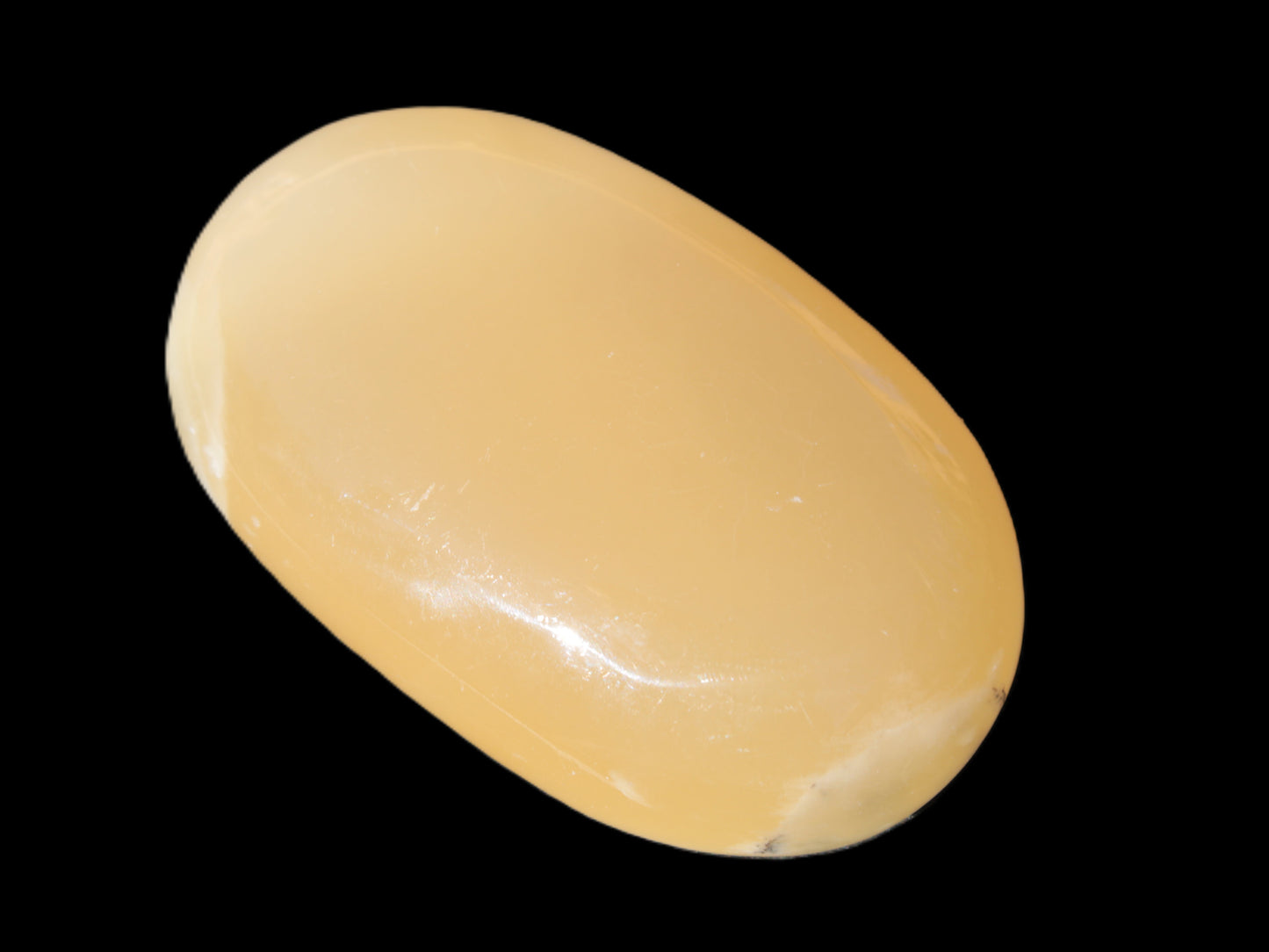 Honey Calcite palm stone 58-62mm 83-95g Rocks and Things