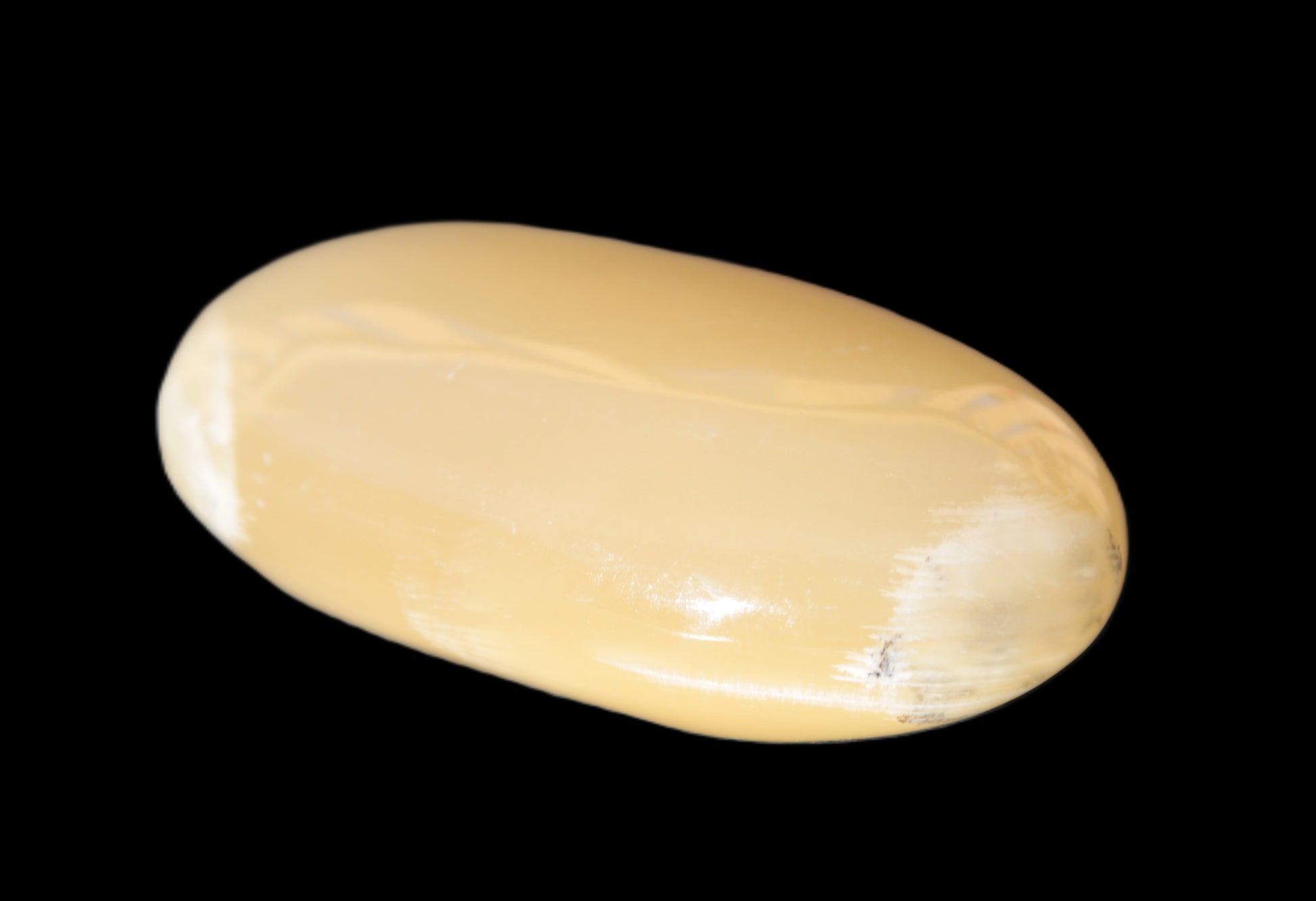 Honey Calcite palm stone 58-62mm 83-95g Rocks and Things