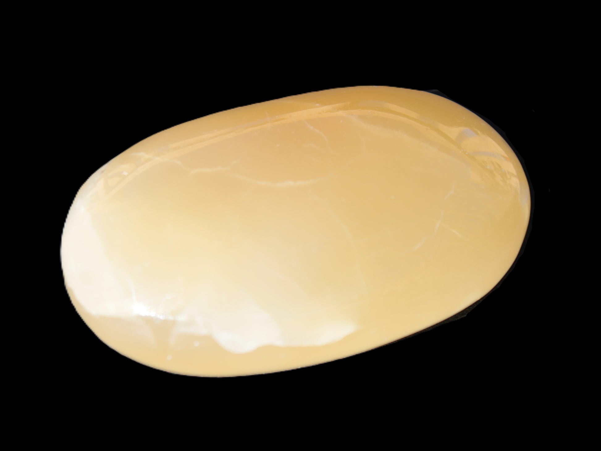 Honey Calcite palm stone 58-62mm 83-95g Rocks and Things