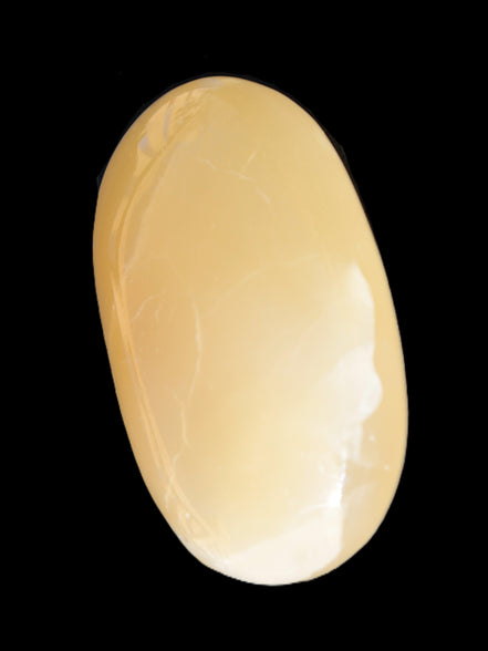 Honey Calcite palm stone 58-62mm 83-95g in sunshine - Rocks and Things Store
