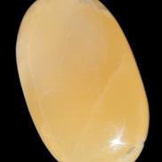 Honey Calcite palm stone 58-62mm 83-95g in sunshine - Rocks and Things Store