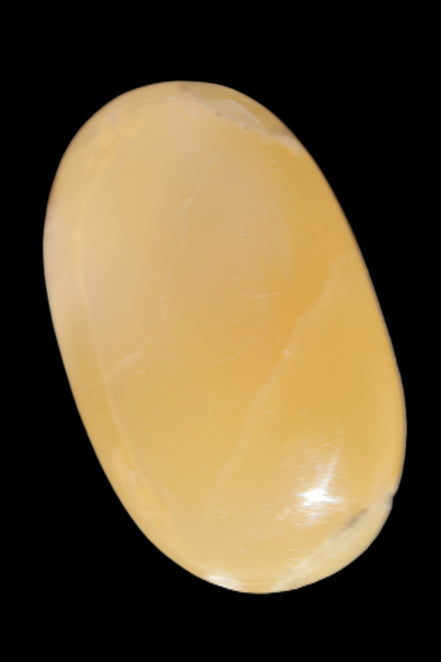 Honey Calcite palm stone 58-62mm 83-95g in sunshine - Rocks and Things Store