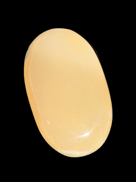 Honey Calcite palm stone 58-62mm 83-95g in sunshine - Rocks and Things Store