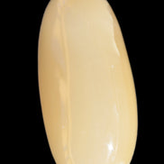 Honey Calcite palm stone 58-62mm 83-95g in sunshine - Rocks and Things Store
