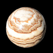 Beautiful Chocolate Calcite sphere 48mm 162g in sunlight - Rocks and Things Store