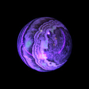 Beautiful Chocolate Calcite sphere 48mm 162g in UV light - Rocks and Things Store