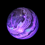 Beautiful Chocolate Calcite sphere 48mm 162g in UV light - Rocks and Things Store