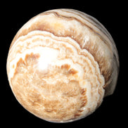 Beautiful Chocolate Calcite sphere 48mm 162g in sunlight - Rocks and Things Store