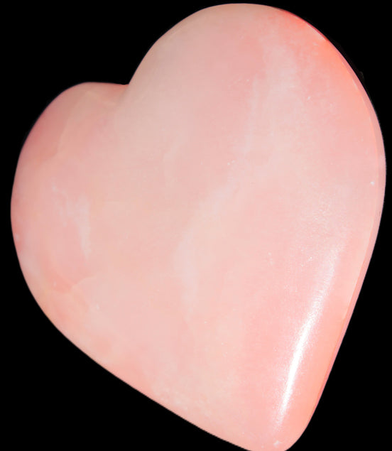 Calcite dyed hand-carved orange heart 71*70*20mm 135.9g in sunlight - Rocks and Things Store