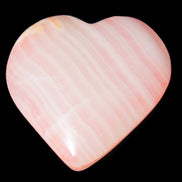 Calcite dyed hand-carved orange heart 71*70*20mm 135.9g in sunlight - Rocks and Things Store