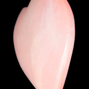 Calcite dyed hand-carved orange heart 71*70*20mm 135.9g in sunlight - Rocks and Things Store