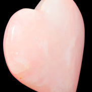 Calcite dyed hand-carved orange heart 71*70*20mm 135.9g in sunlight - Rocks and Things Store