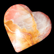 Calcite dyed hand-carved heart 61*58*16mm 85.5g in sunlight - Rocks and Things Store