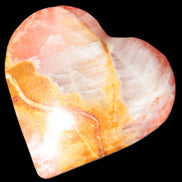 Calcite dyed hand-carved heart 61*58*16mm 85.5g in sunlight - Rocks and Things Store