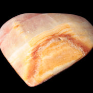 Calcite dyed hand-carved heart 61*58*16mm 85.5g in sunlight - Rocks and Things Store