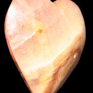 Calcite dyed hand-carved heart 61*58*16mm 85.5g in sunlight - Rocks and Things Store