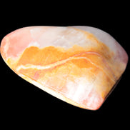 Calcite dyed hand-carved heart 61*58*16mm 85.5g in sunlight - Rocks and Things Store