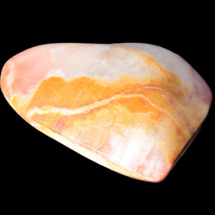 Calcite dyed hand-carved heart 61*58*16mm 85.5g in sunlight - Rocks and Things Store