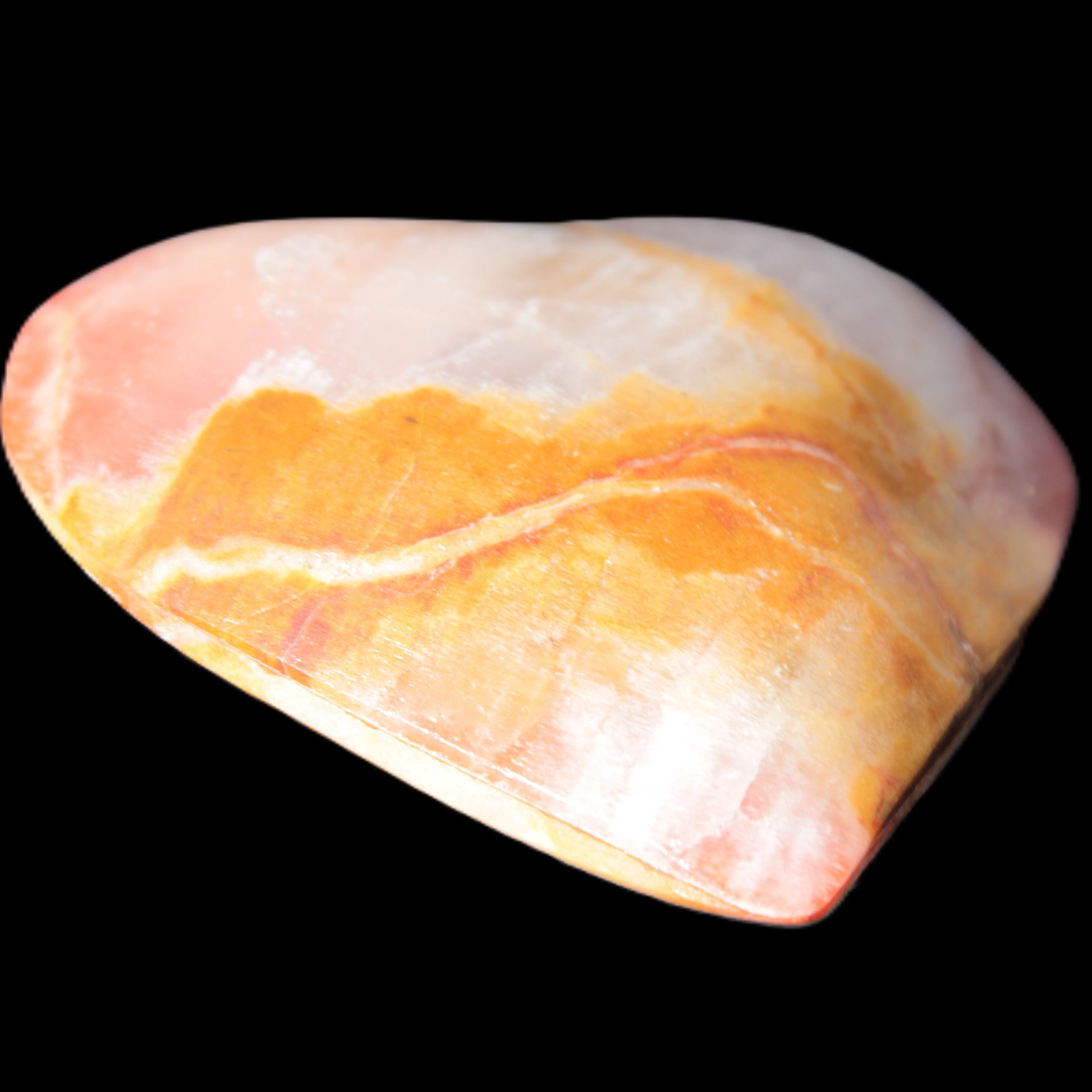 Calcite dyed hand-carved heart 61*58*16mm 85.5g in sunlight - Rocks and Things Store