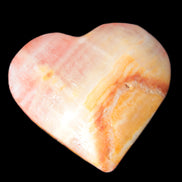 Calcite dyed hand-carved heart 61*58*16mm 85.5g in sunlight - Rocks and Things Store