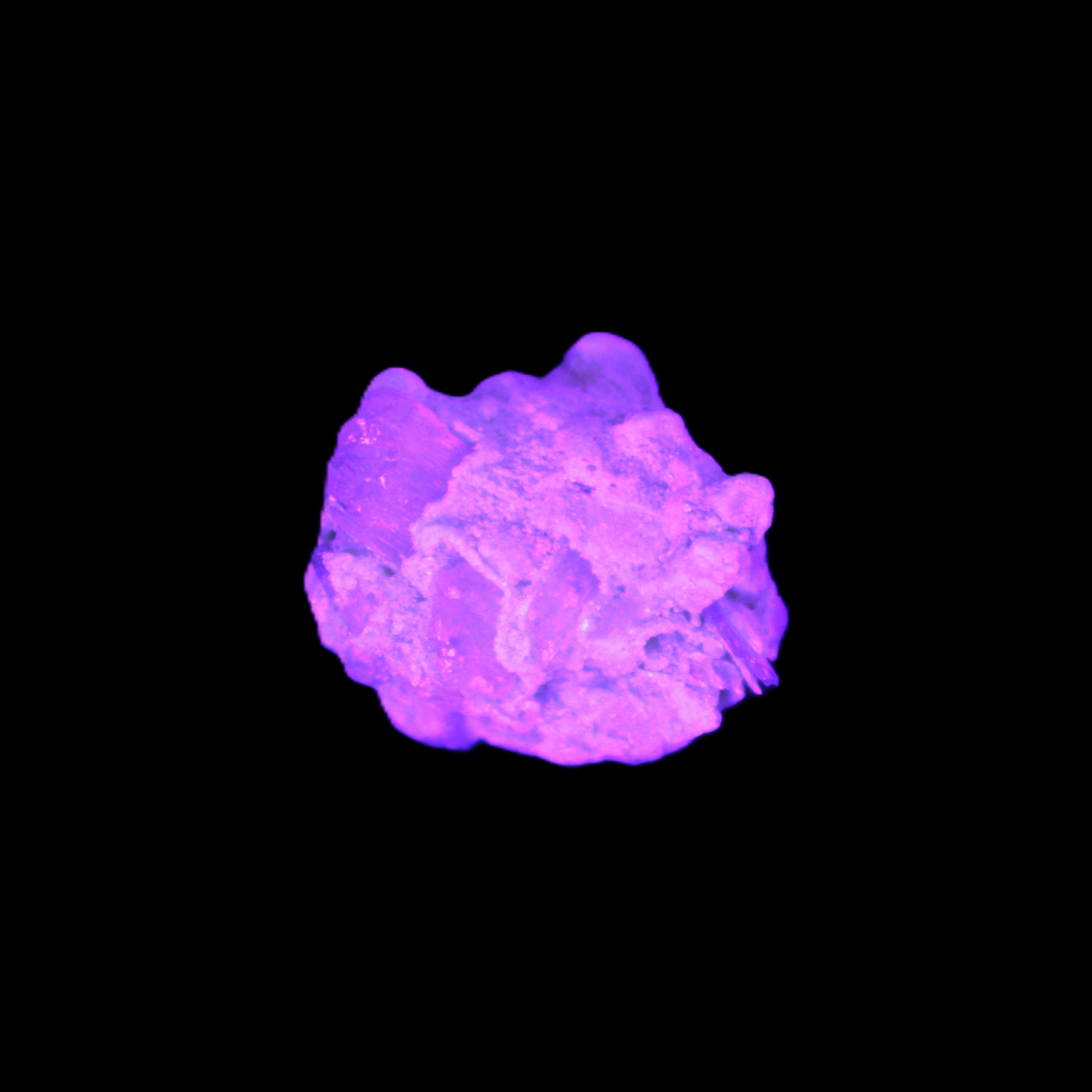 Tiny Kunzite crystals in matrix from Afghanistan 20mm 18.2ct 3.6g in UV light