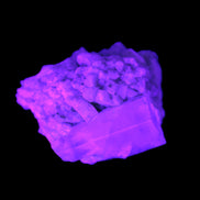 Blue Terminated Aquamarine crystal 21mm on Feldspar & Mica  in UV light