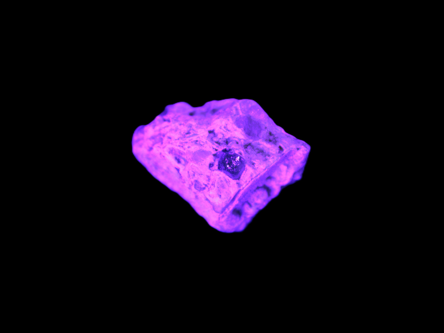 Tiny Emerald crystal with Green Tourmaline in matrix from Afghanistan in UV light