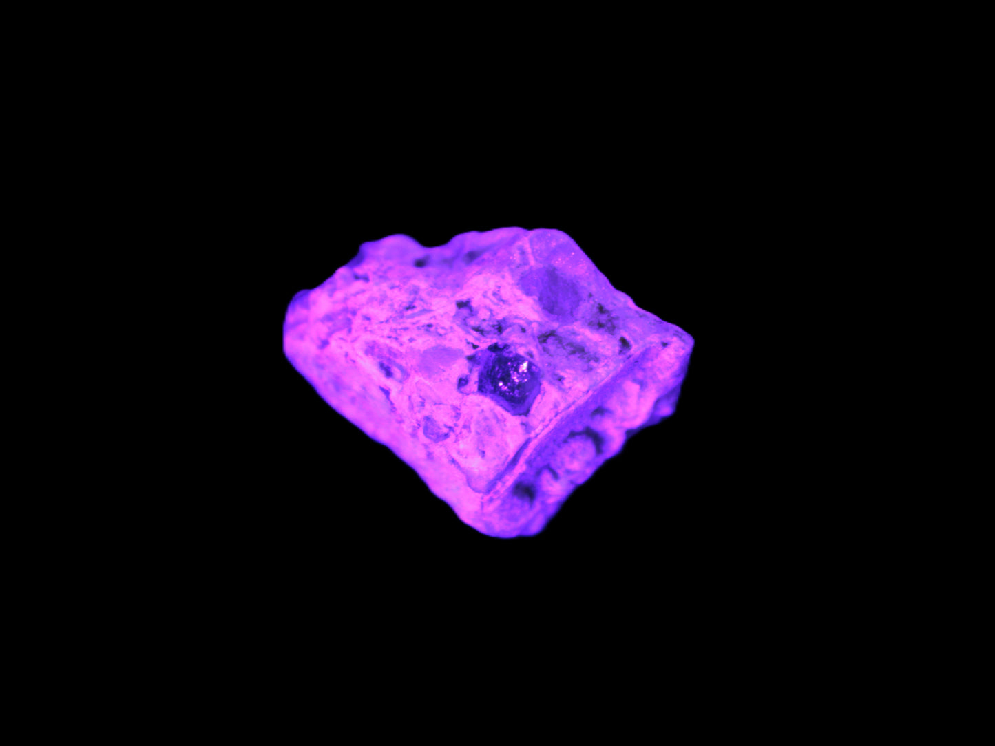 Tiny Emerald crystal with Green Tourmaline in matrix from Afghanistan in UV light