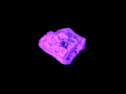 Tiny Emerald crystal with Green Tourmaline in matrix from Afghanistan in UV light