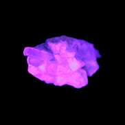 Thin Clear Aquamarine with tiny Lemurian Quartz crystals in UV light