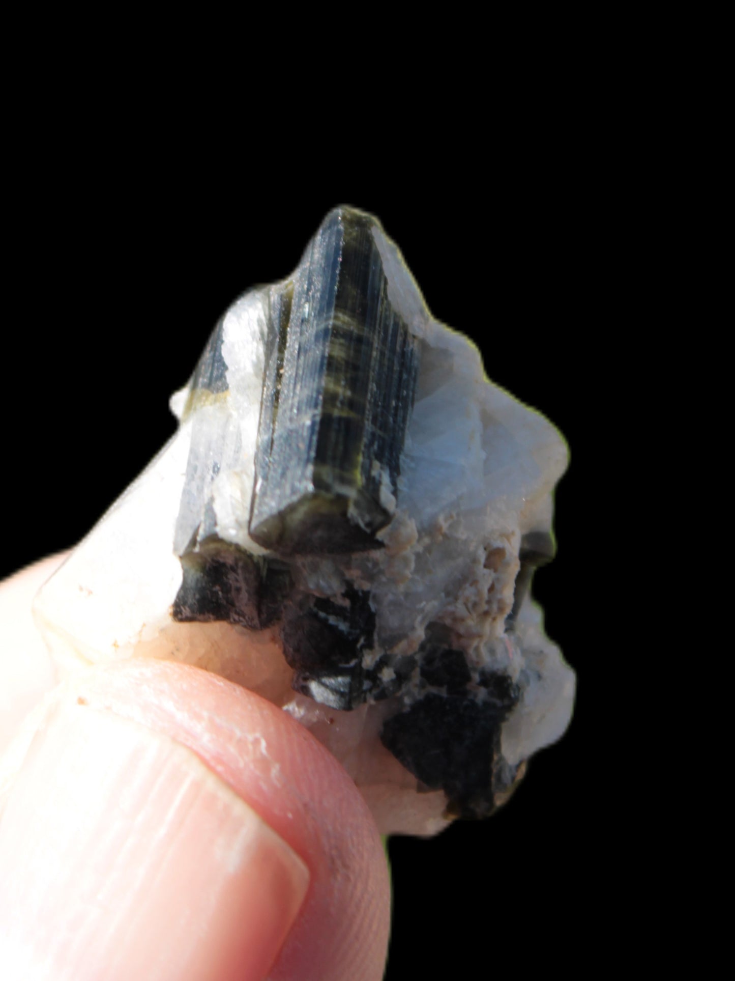 Black Elbaite cluster in matrix in sunshine