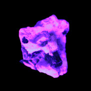 Unusual Olive Green with Pink Tourmaline in matrix 8.2g in UV light